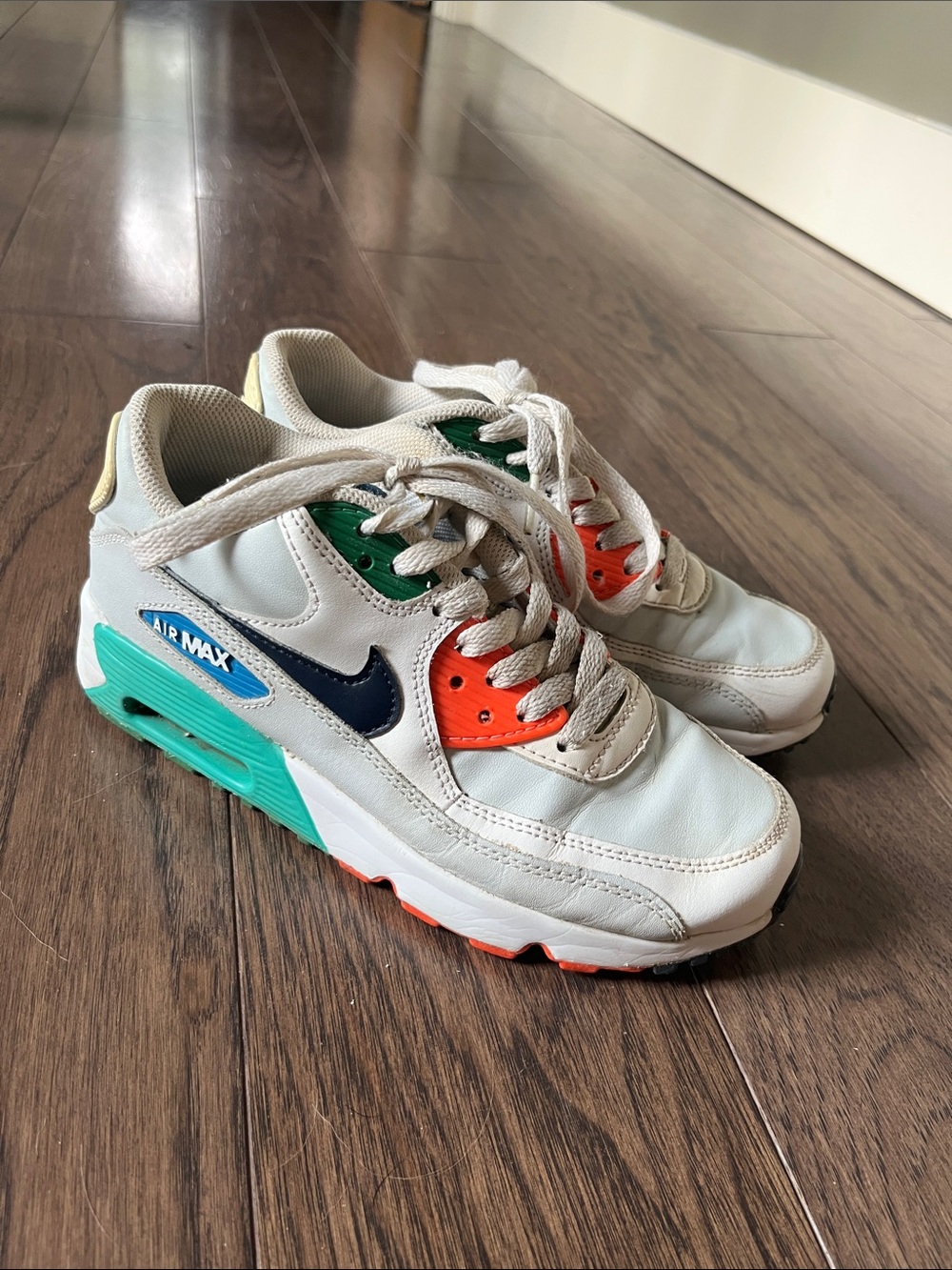 Nike Kids White Sneakers with Teal and Orange Accents